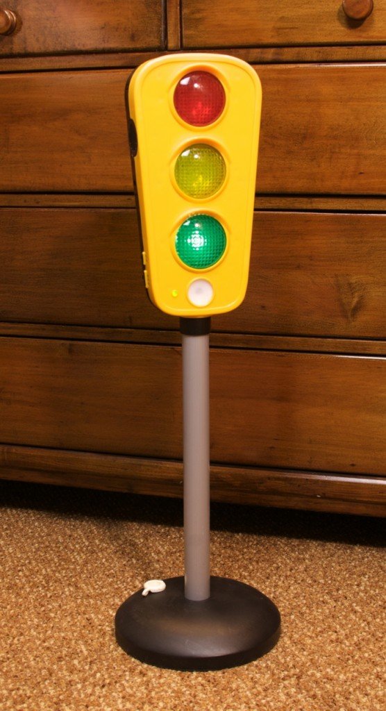 Traffic light toys, old and new, for little kids and big.